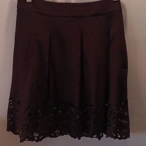 Bcbgmaxazria black pleated Kailin cutout hem skirt EUC